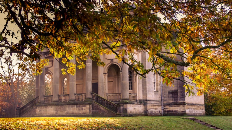 Gibside Chapel framed by autumn leaves